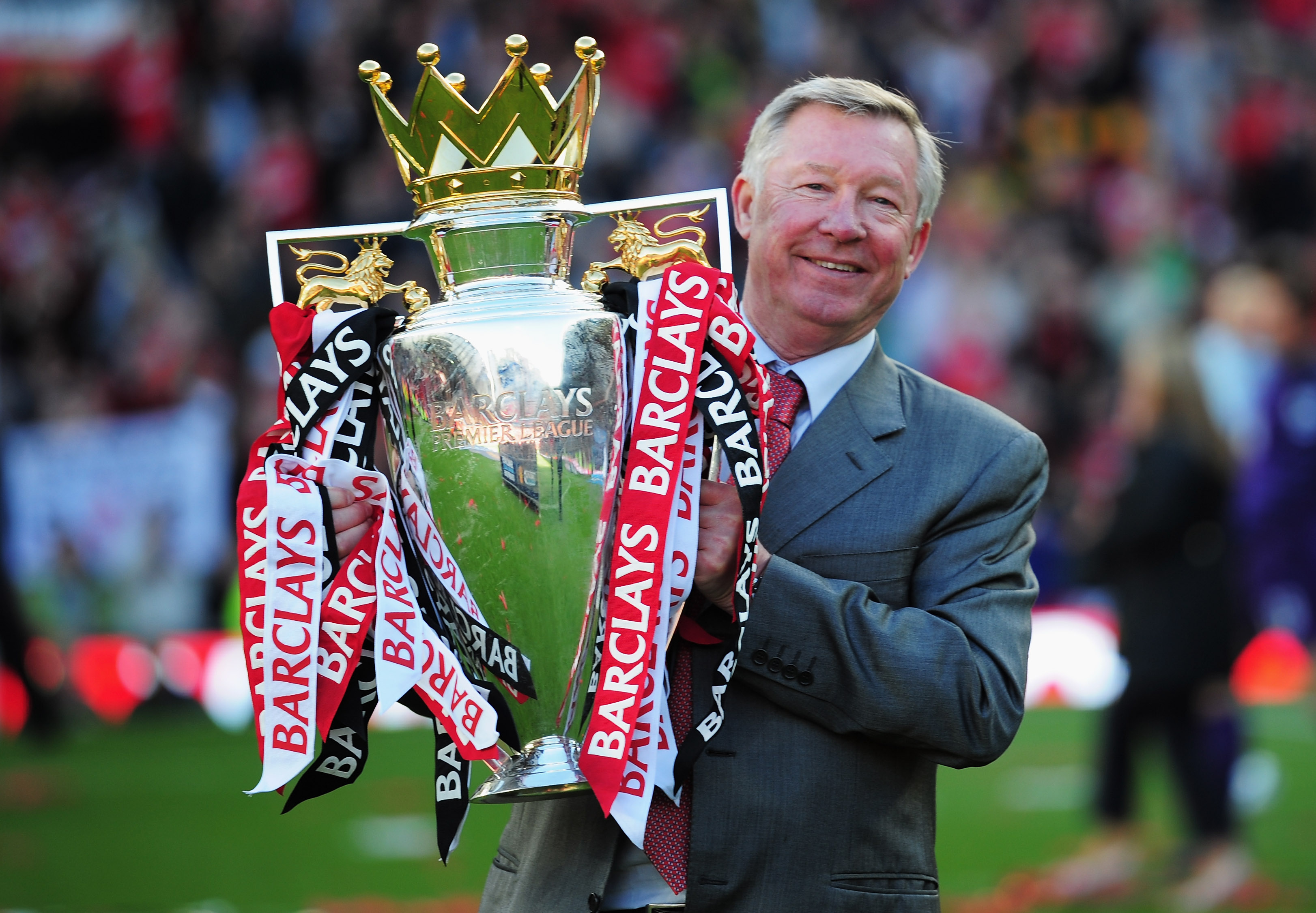 MANCHESTER, ENGLAND - MAY 22:  Sir Alex Ferguson manager of Manchester United lifts the Premier League trophy after the Barclays Premier League match between Manchester United and Blackpool at Old Trafford on May 22, 2011 in Manchester, England. Mancheste