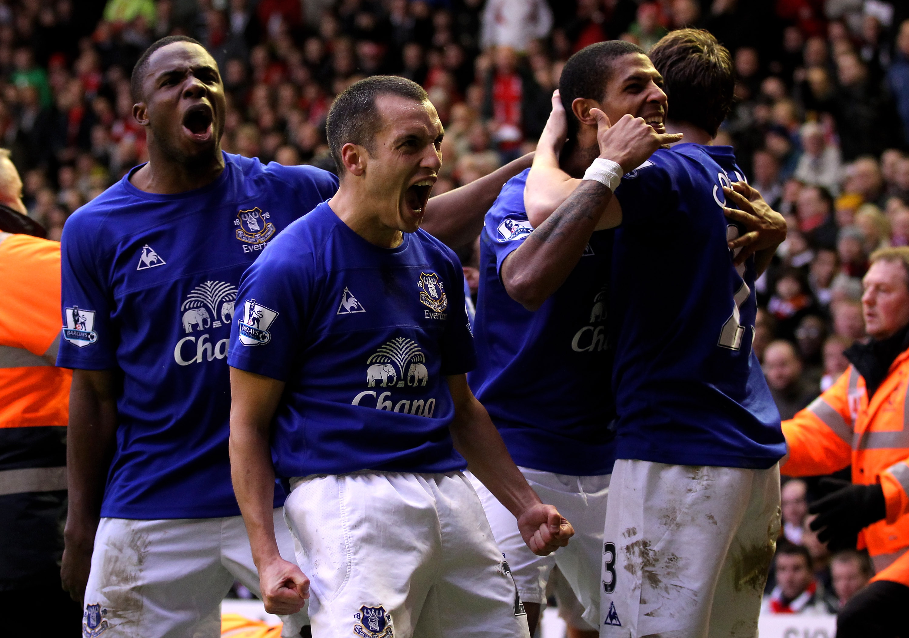 LIVERPOOL, ENGLAND - JANUARY 16:  Jermaine Beckford of Everton celebrates scoring his team's second goal with team mates Leon Osman and Victor Anichebe (L) during the Barclays Premier League match between Liverpool and Everton at Anfield on January 16, 20