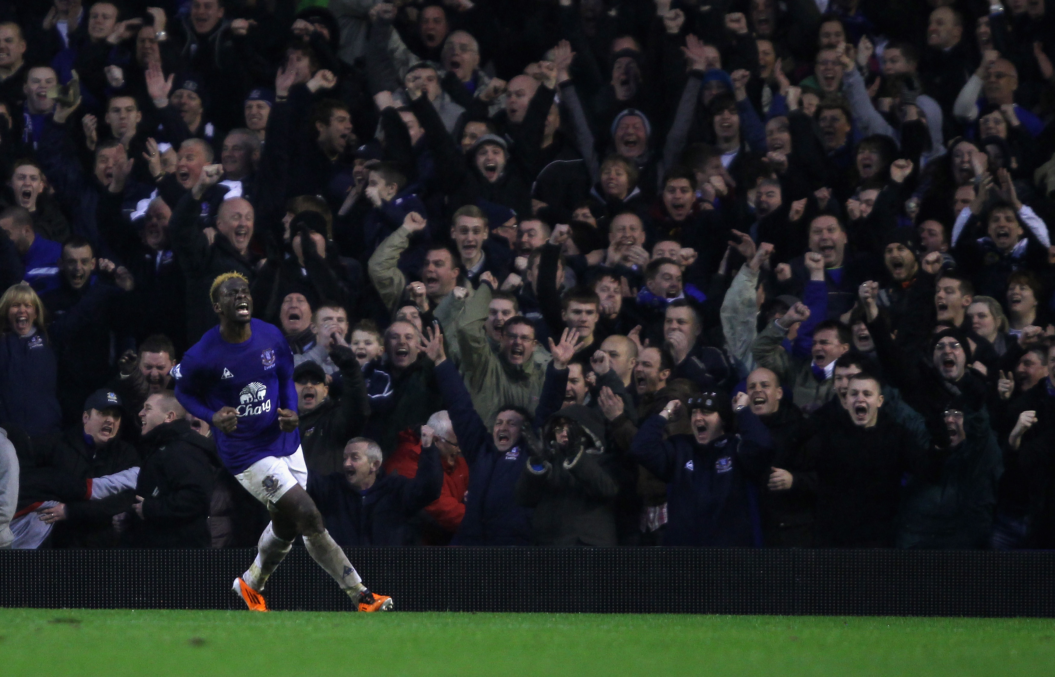 LIVERPOOL, ENGLAND - FEBRUARY 05:  Louis Saha of Everton runs away to celebrate after scoring his teams third goal and equalizer during the Barclays Premier League match between Everton and Blackpool at Goodison Park on February 5, 2011 in Liverpool, Engl