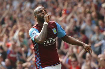 BIRMINGHAM, ENGLAND - APRIL 23:  Darren Bent of Aston Villa celebrates scoring the equaliser during the Barclays Premier League match between Aston Villa and Stoke City at Villa Park on April 23, 2011 in Birmingham, England.  (Photo by Laurence Griffiths/