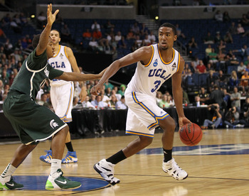 TAMPA, FL - MARCH 17:  Malcolm Lee #3 of the UCLA Bruins looks to pass against the Michigan State Spartans during the second round of the 2011 NCAA men's basketball tournament at St. Pete Times Forum on March 17, 2011 in Tampa, Florida. UCLA won 78-76. (P