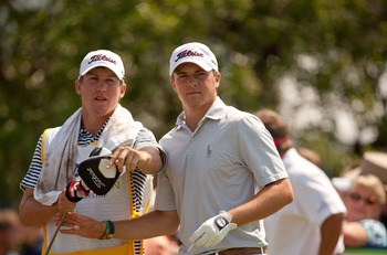 IRVING, TX - MAY 27: Jordan Spieth takes a club from caddie Kramer Hickock during the second round of the HP Byron Nelson Championship at TPC Four Seasons at Las Colinas on May 27, 2011 in Irving, Texas. (Photo by Darren Carroll/Getty Images)