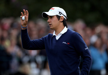 VIRGINIA WATER, ENGLAND - MAY 27:  Matteo Manassero of Italy acknowledges the crowd on the 18th green during the second round of the BMW PGA Championship at the Wentworth Club on May 27, 2011 in Virginia Water, England.  (Photo by Warren Little/Getty Imag