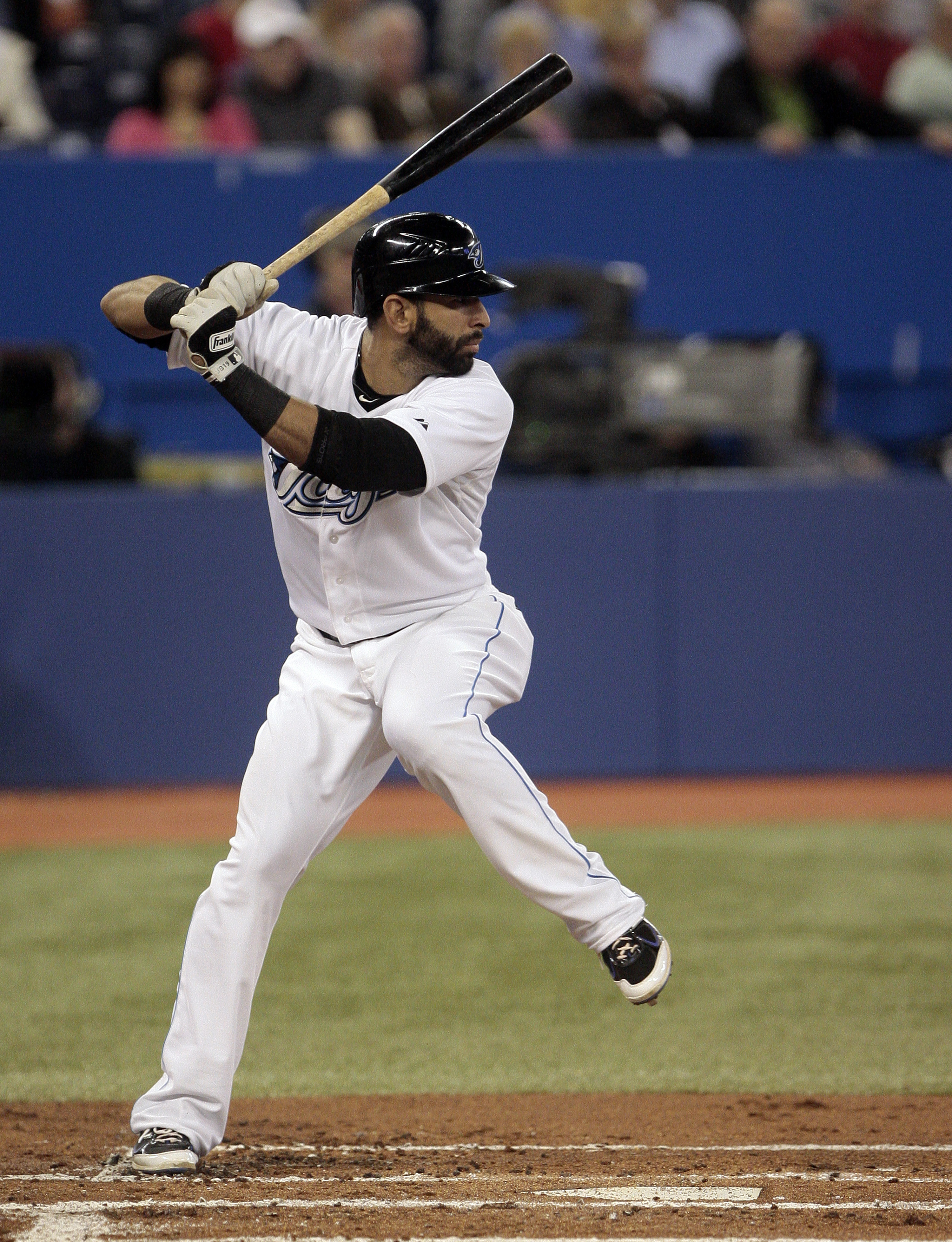 TORONTO, CANADA - MAY 18: Jose Bautista #19 of the Toronto Blue Jays hits against the Tampa Bay Rays during MLB action at the Rogers Centre May 18, 2011 in Toronto, Ontario, Canada. (Photo by Abelimages/Getty Images)