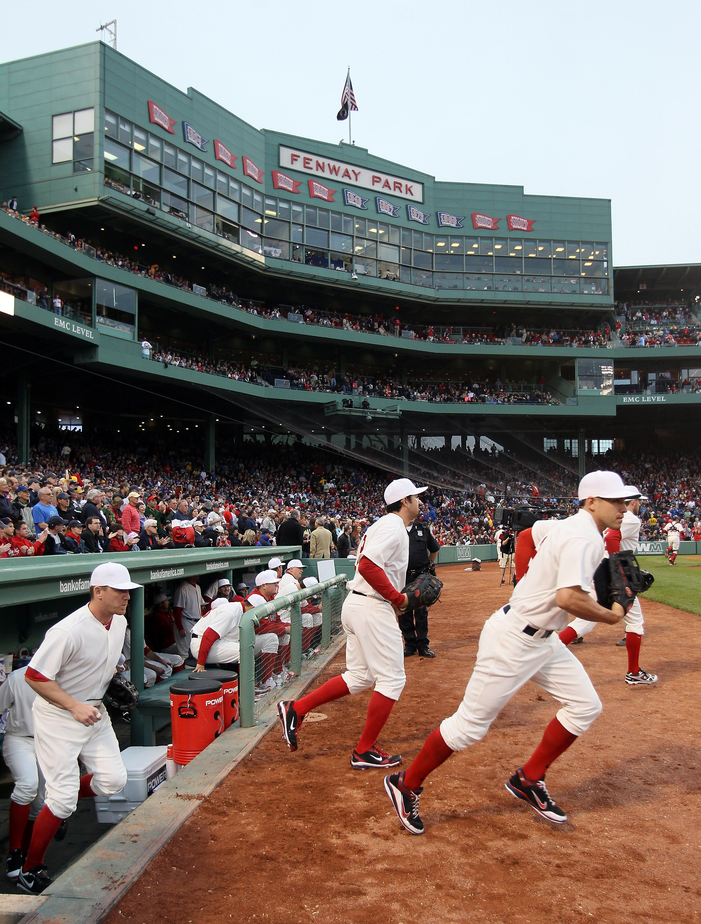 BOSTON, MA - MAY 21: The Boston Red Sox take the field for the game against the Chicago Cubs on May 21, 2011 at Fenway Park in Boston, Massachusetts. Tonight the Chicago Cubs and the Boston Red Sox are wearing replica uniforms from 1918. Before this seri