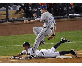 Photo Source: http://www.allvoices.com/contributed-news/7618903/image/65392671-texas-rangers-starting-pitcher-cliff-lee-puts-out-new-york-yankees-brett-gardner-sliding