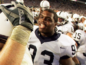 MIAMI - JANUARY 4: Offensive lineman Andrew Richardson #50 of the Penn State Nittany Lions celebrates with quarterback Michael Robinson #12 and Chris Baker #93 after defeating the Florida State Seminoles during the FedEx Orange Bowl on January 4, 2006 at