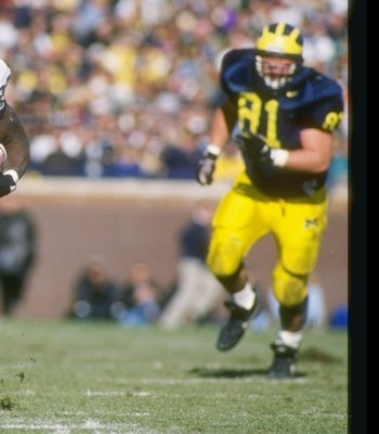 16 Nov 1996:  Tailback Curtis Enis of the Penn State Nittany Lions runs down the field during a game against the Michigan Wolverines at Michigan Stadium in Ann Arbor, Michigan.  Penn State won the game 23-17. Mandatory Credit: Brian Bahr  /Allsport
