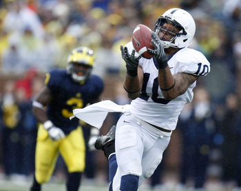 ANN ARBOR, MI - OCTOBER 24: Andrew Quarless #10 of the Penn State Nittany Lions catches a second quarter touchdown pass in front of Stevie Brown #3 of the Michigan Wolverines on October 24, 2009 at Michigan Stadium in Ann Arbor, Michigan.  (Photo by Grego