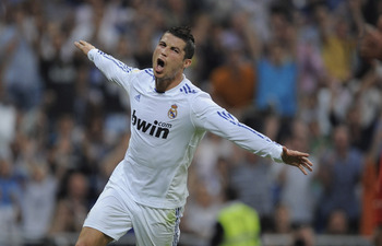 MADRID, SPAIN - MAY 21:  Cristiano Ronaldo of Real Madrid celebrates after scoring his second goal during the La Liga match between Real Madrid and UD Almeria at Estadio Santiago Bernabeu on May 21, 2011 in Madrid, Spain.  (Photo by Denis Doyle/Getty Imag