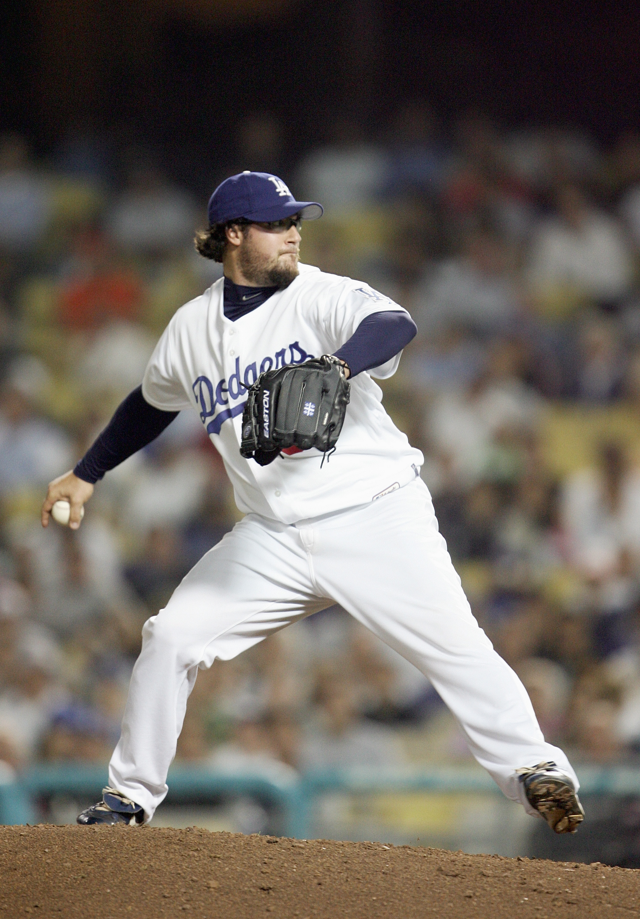 Yes, that's former Dodger Eric Gagne behind the bar  and on the big  screen - Los Angeles Times