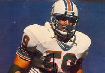 BOB BRUDZINSKI MIAMI DOLPHINS ACTION SIGNED 8x10