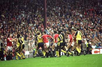 20 Oct 1990:  Manchester United and Arsenal players fight on the pitch during the Barclays League Division One match at Old Trafford in Manchester, England. Arsenal won the match 1-0. \ Mandatory Credit: Russell  Cheyne/Allsport