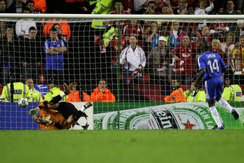 LIVERPOOL, UNITED KINGDOM - MAY 01:  Pepe Reina of Liverpool saves the penalty from Geremi (#14) of Chelsea during the UEFA Champions League semi final second leg match between Liverpool and Chelsea at Anfield on May 1, 2007 in Liverpool, England.  (Photo