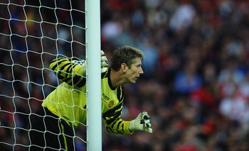 LONDON, ENGLAND - MAY 28:  Edwin van der Sar  of Manchester United looks on during the UEFA Champions League final between FC Barcelona and Manchester United FC at Wembley Stadium on May 28, 2011 in London, England.  (Photo by Laurence Griffiths/Getty Ima
