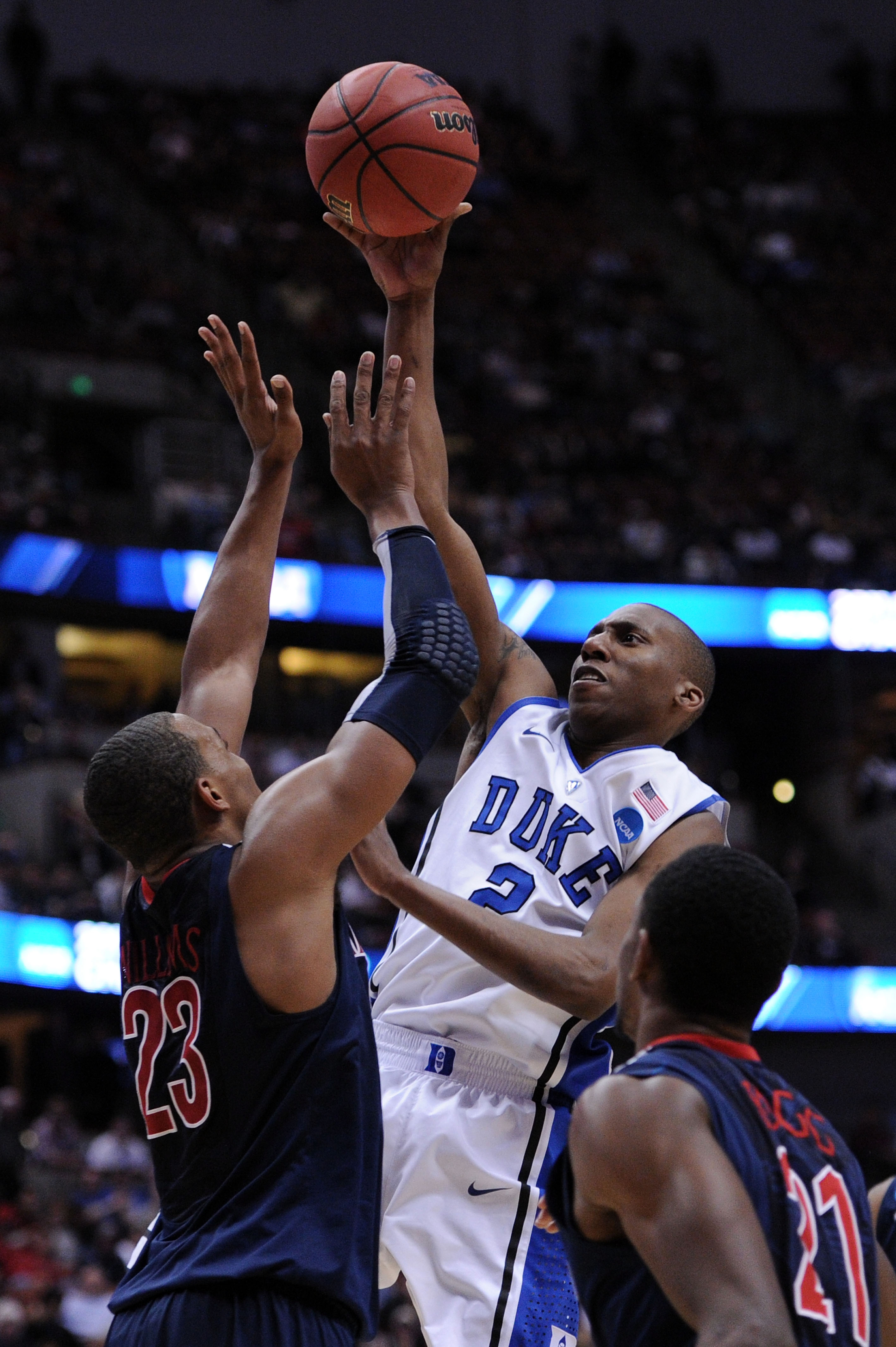 ANAHEIM, CA - MARCH 24:  Nolan Smith #2 of the Duke Blue Devils shoot the ball over Derrick Williams #23 of the Arizona Wildcats during the west regional semifinal of the 2011 NCAA men's basketball tournament at the Honda Center on March 24, 2011 in Anahe