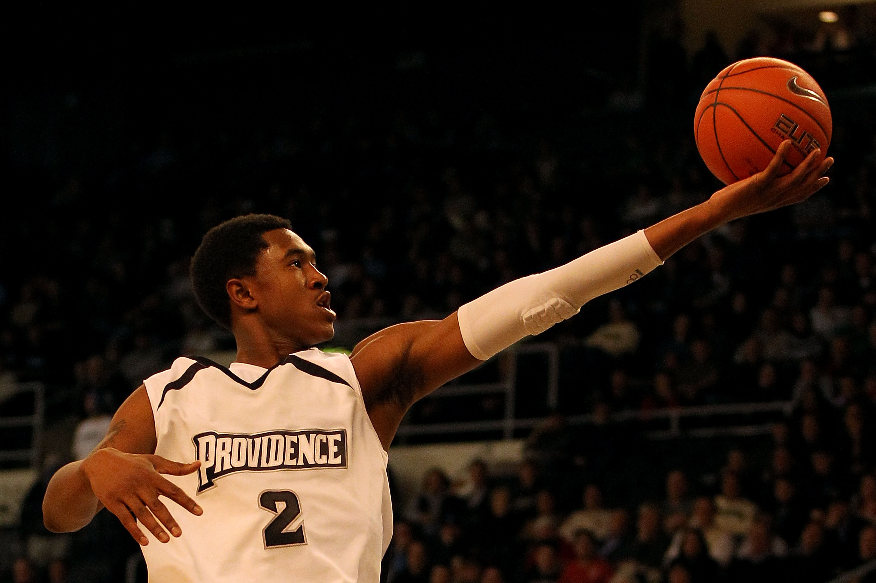 PROVIDENCE, RI - DECEMBER 04:  Marshon Brooks #2 of the Providence Friars drives for a shot attempt against the Rhode Island Rams at the Dunkin' Donuts Center on December 4, 2010 in Providence, Rhode Island.  (Photo by Chris Chambers/Getty Images)