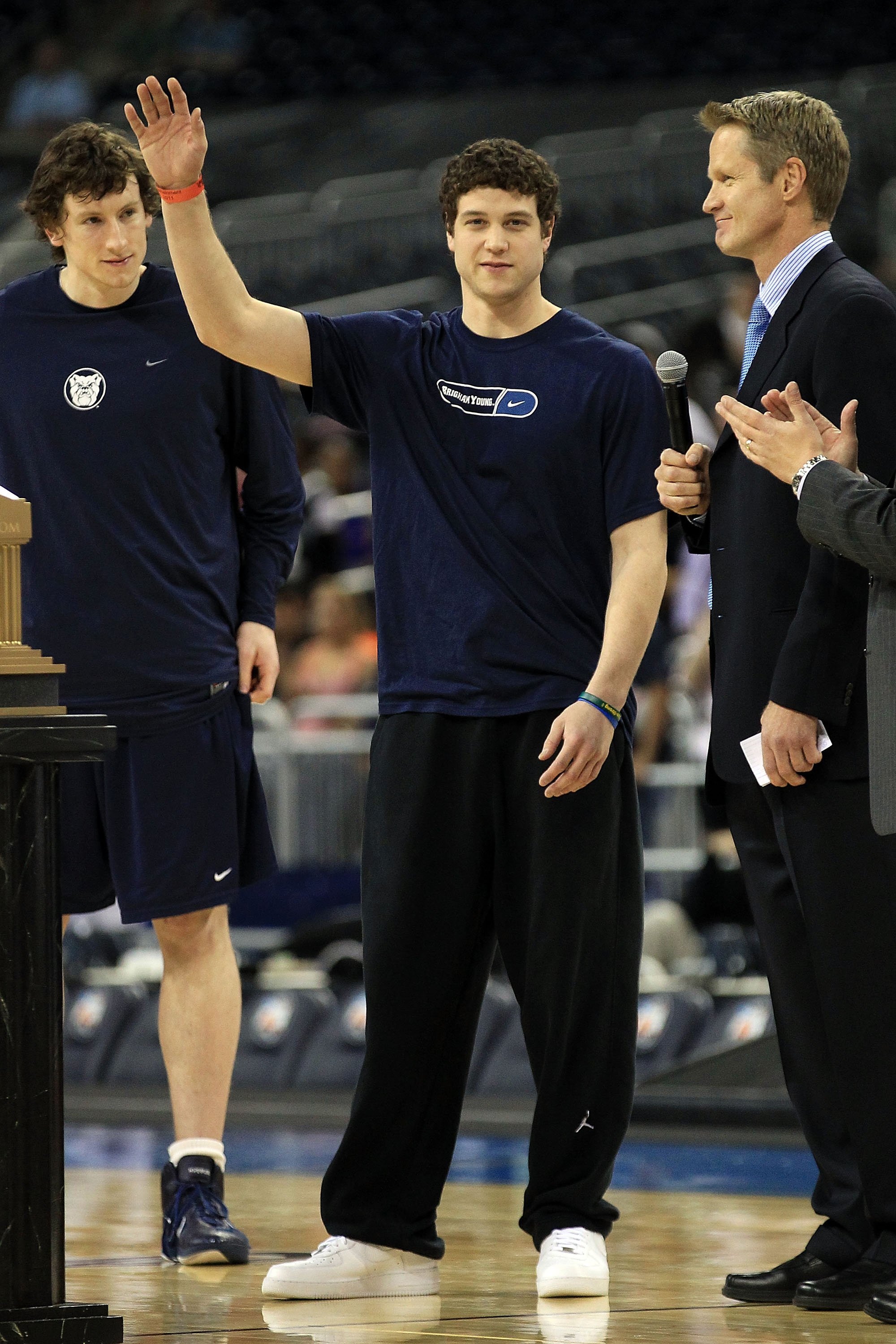 HOUSTON, TX - APRIL 01:  Jimmer Fredette of BYU is named the most outstanding senior student-athlete as it broadcaster Steve Kerr presents him with the award during practice prior to the 2011 Final Four of the NCAA Division I Men's Basketball Tournament a