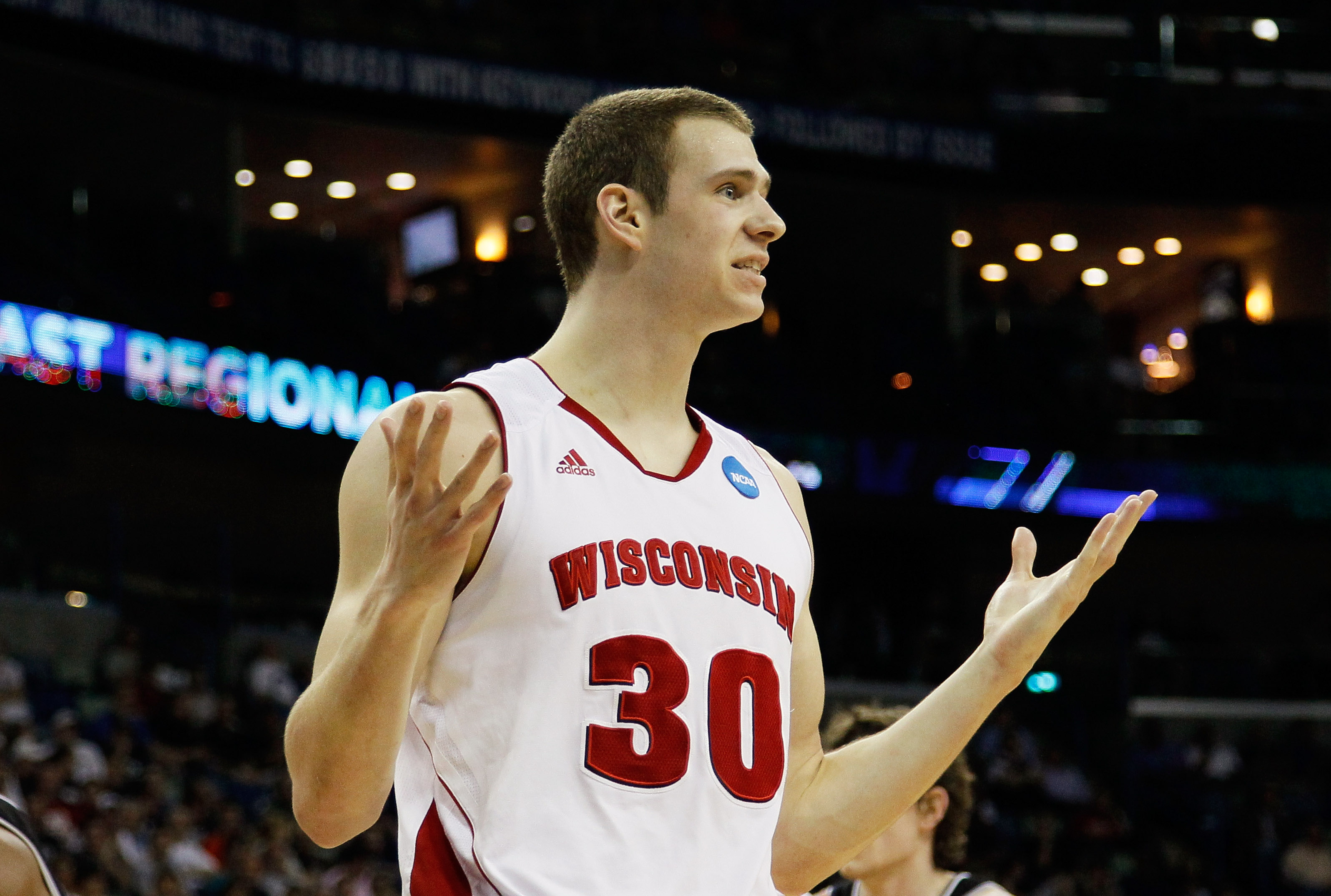 NEW ORLEANS, LA - MARCH 24:  Jon Leuer #30 of the Wisconsin Badgers reacts after being called for a foul against the Butler Bulldogs during the Southeast regional of the 2011 NCAA men's basketball tournament at New Orleans Arena on March 24, 2011 in New O
