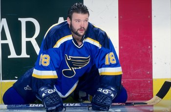13 Jan 1999: Tony Twist #18 of the St. Louis Blues stretches out on the ice before the game against the Buffalo Sabres at the Marine Midland Arena in Buffalo, New York. The Blues defeated the Sabres 4-2.