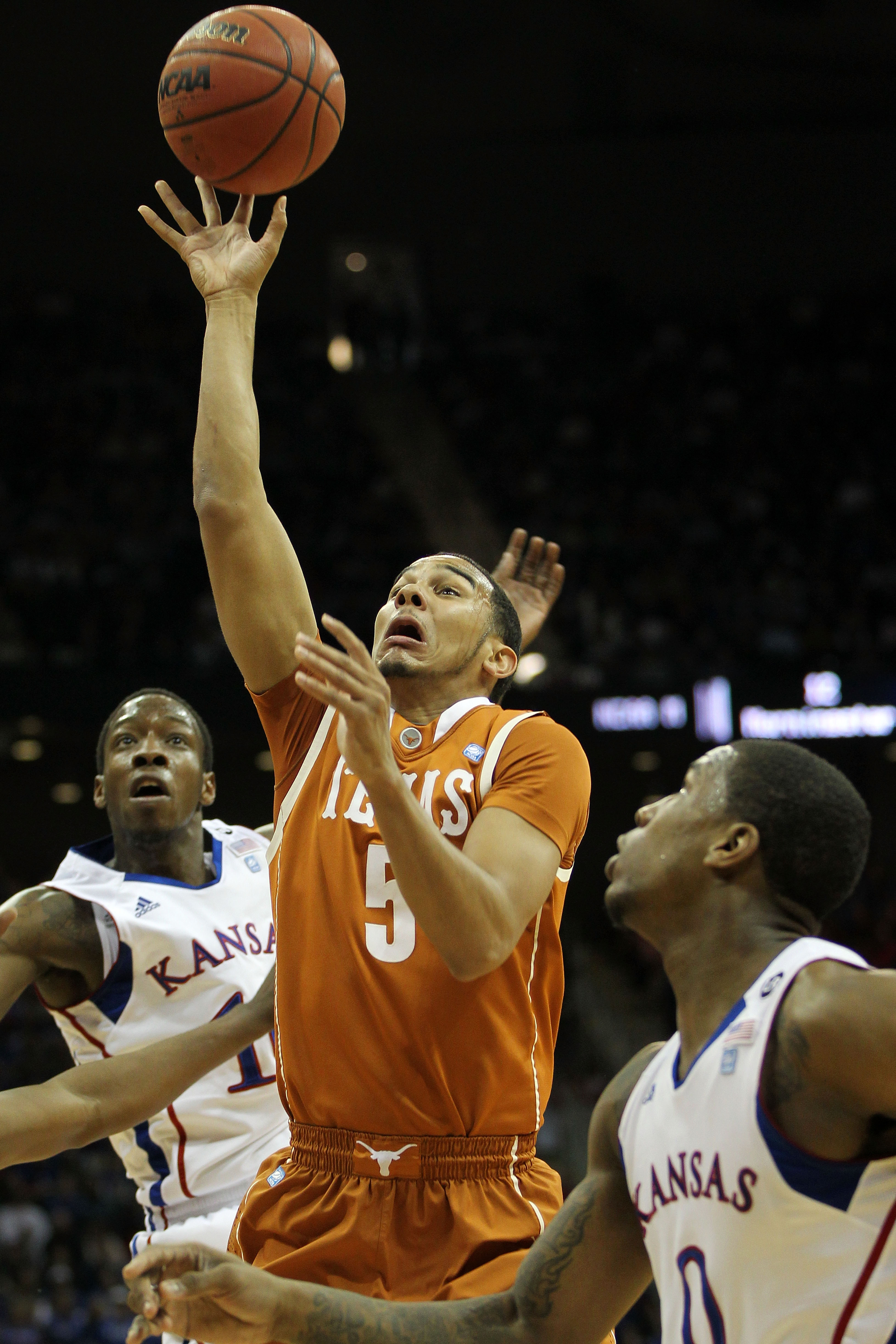 KANSAS CITY, MO - MARCH 12:  Cory Joseph #5 of the Texas Longhorns goes up for a shot against the Kansas Jayhawks in the first half of the 2011 Phillips 66 Big 12 Men's Basketball Tournament championship game at Sprint Center on March 12, 2011 in Kansas C