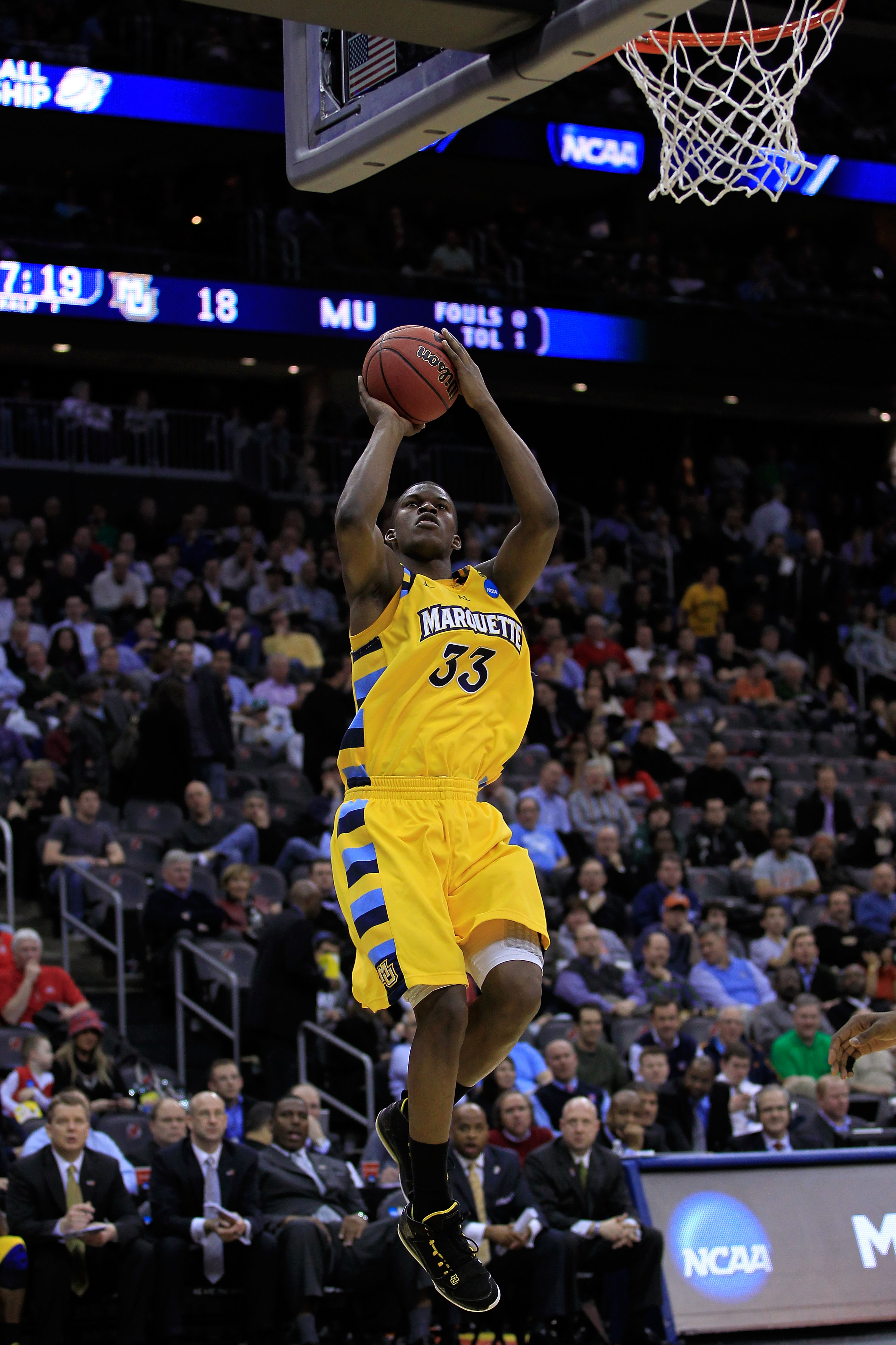 NEWARK, NJ - MARCH 25:  Jimmy Butler #33 of the Marquette Golden Eagles in action against the North Carolina Tar Heels during the east regional semifinal of the 2011 NCAA Men's Basketball Tournament at the Prudential Center on March 25, 2011 in Newark, Ne