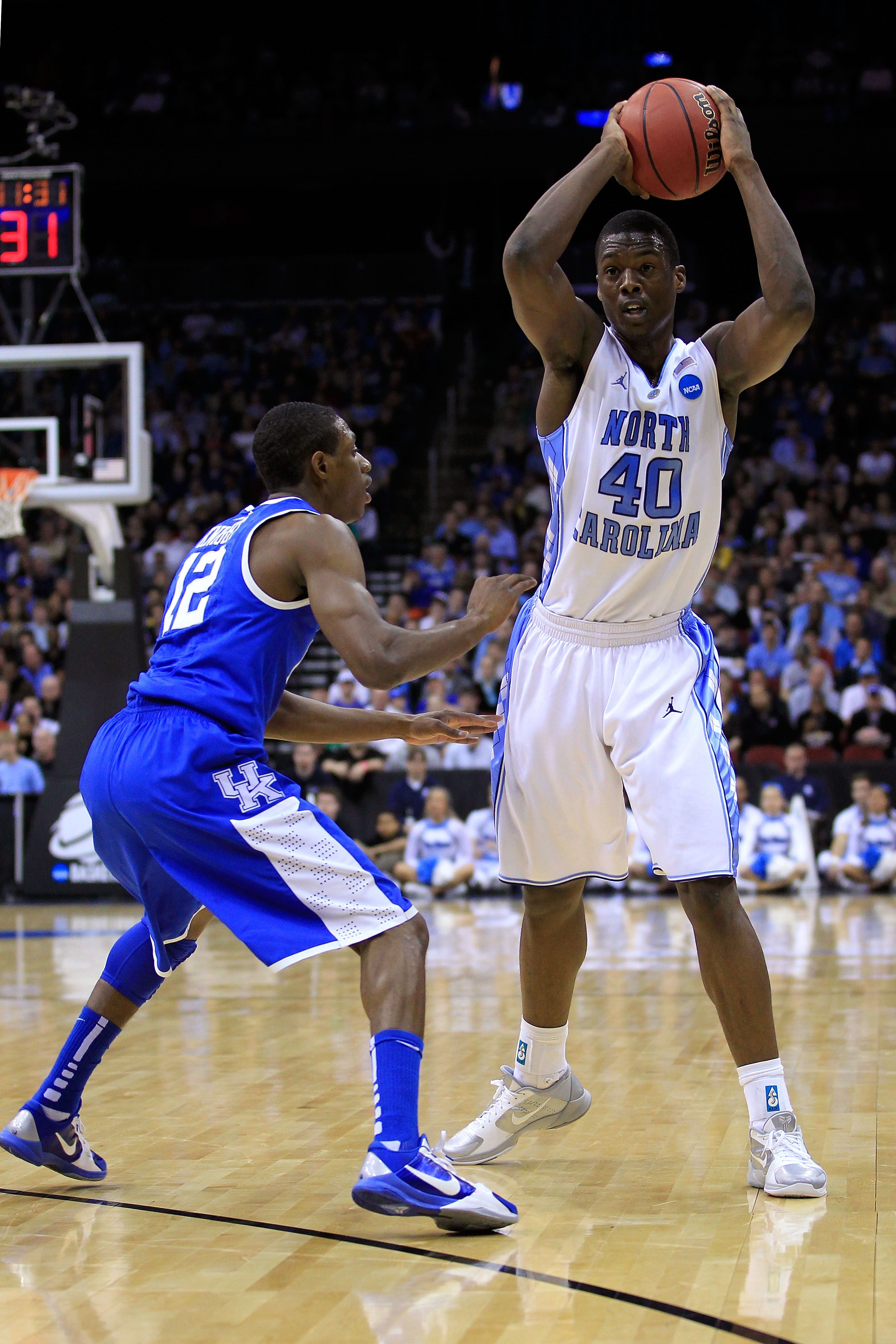 NEWARK, NJ - MARCH 27:  Harrison Barnes #40 of the North Carolina Tar Heels in action against Brandon Knight #12 of the Kentucky Wildcats during the east regional final of the 2011 NCAA men's basketball tournament at Prudential Center on March 27, 2011 in