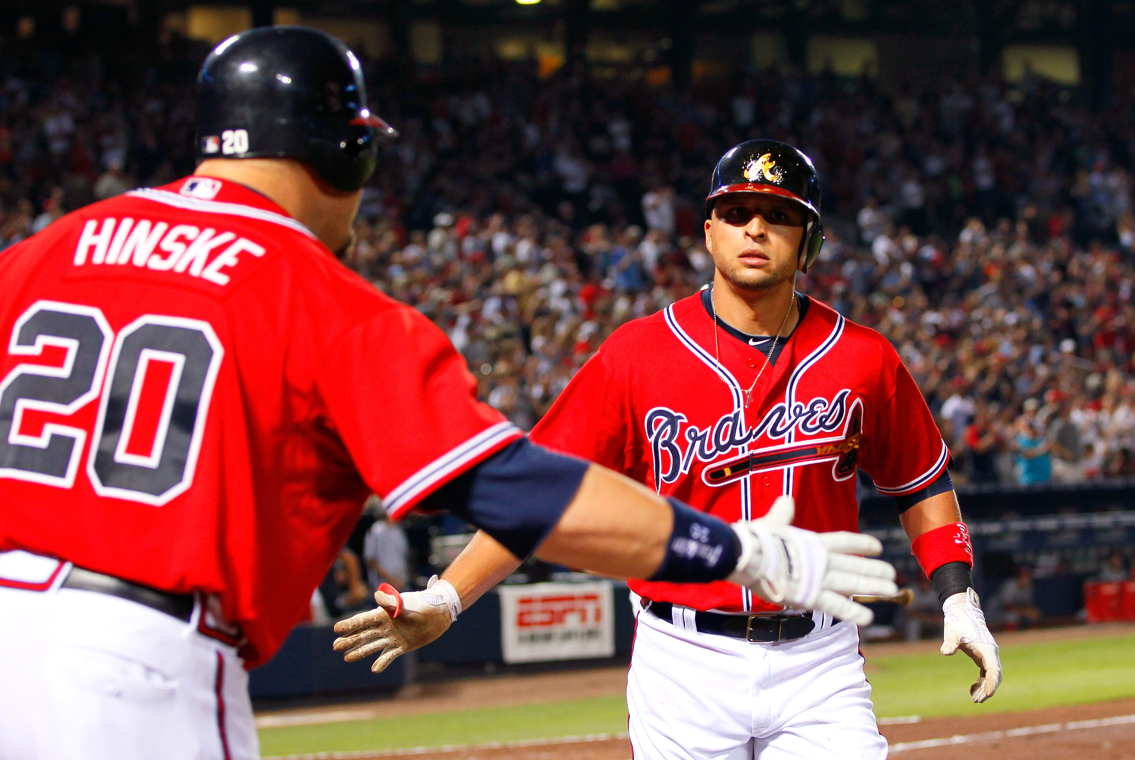 Justin Upton #8 of the Atlanta Braves hits a walk-off homer against the Washington  Nationals at Turner Field.