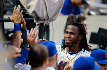 NEW YORK, NY - MAY 28:  Jose Reyes #7 of the New York Mets is congratulated by his teammates for scoring in the third inning against the Philadelphia Phillies at Citi Field on May 28, 2011 in the Flushing neighborhood of the Queens borough of New York Cit