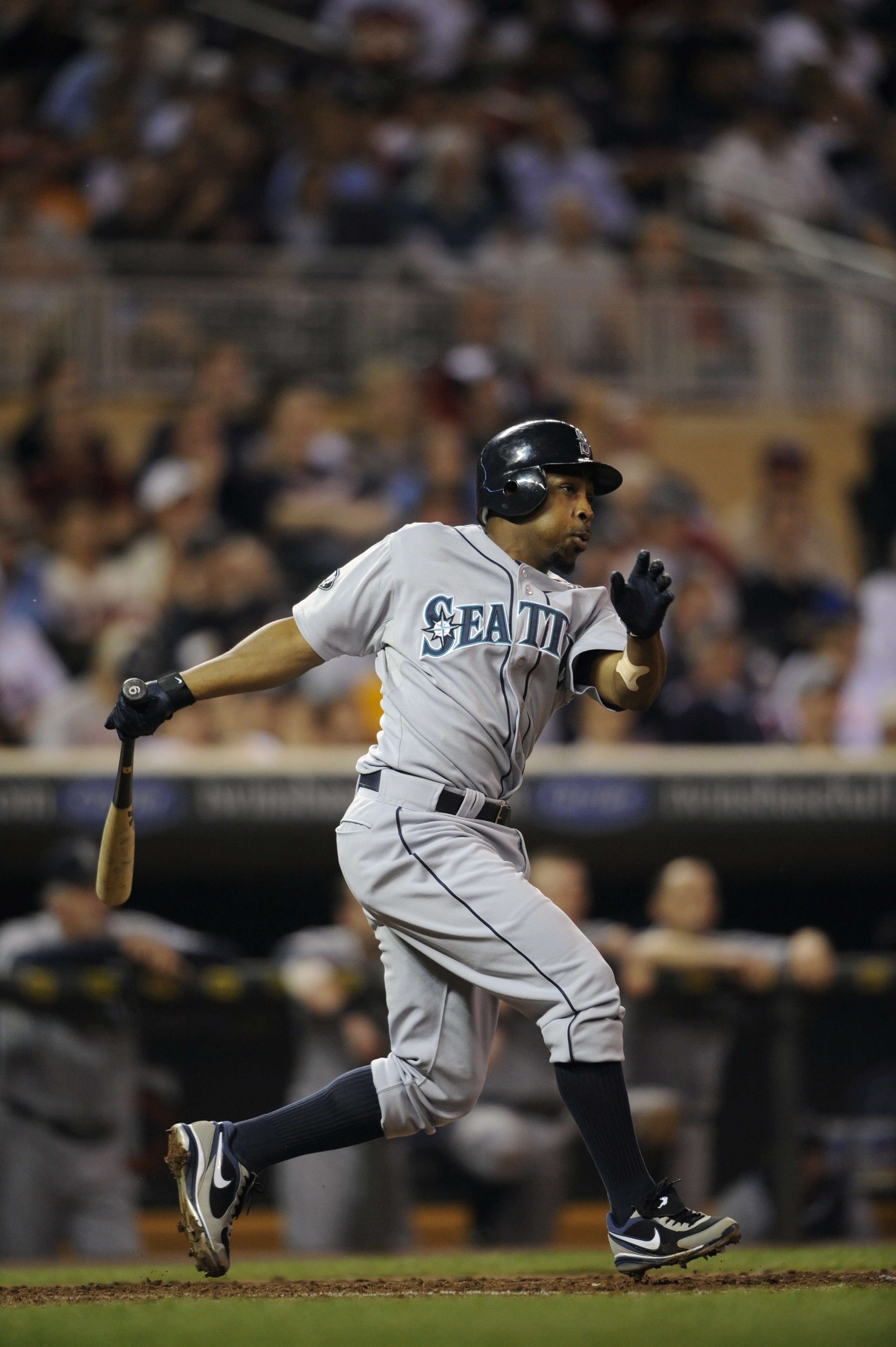 August 17, 2010; Chicago, IL, USA; San Diego Padres third baseman Miguel  Tejada (10) stands on first base after a walk during the first inning  against the Chicago Cubs at Wrigley Field.