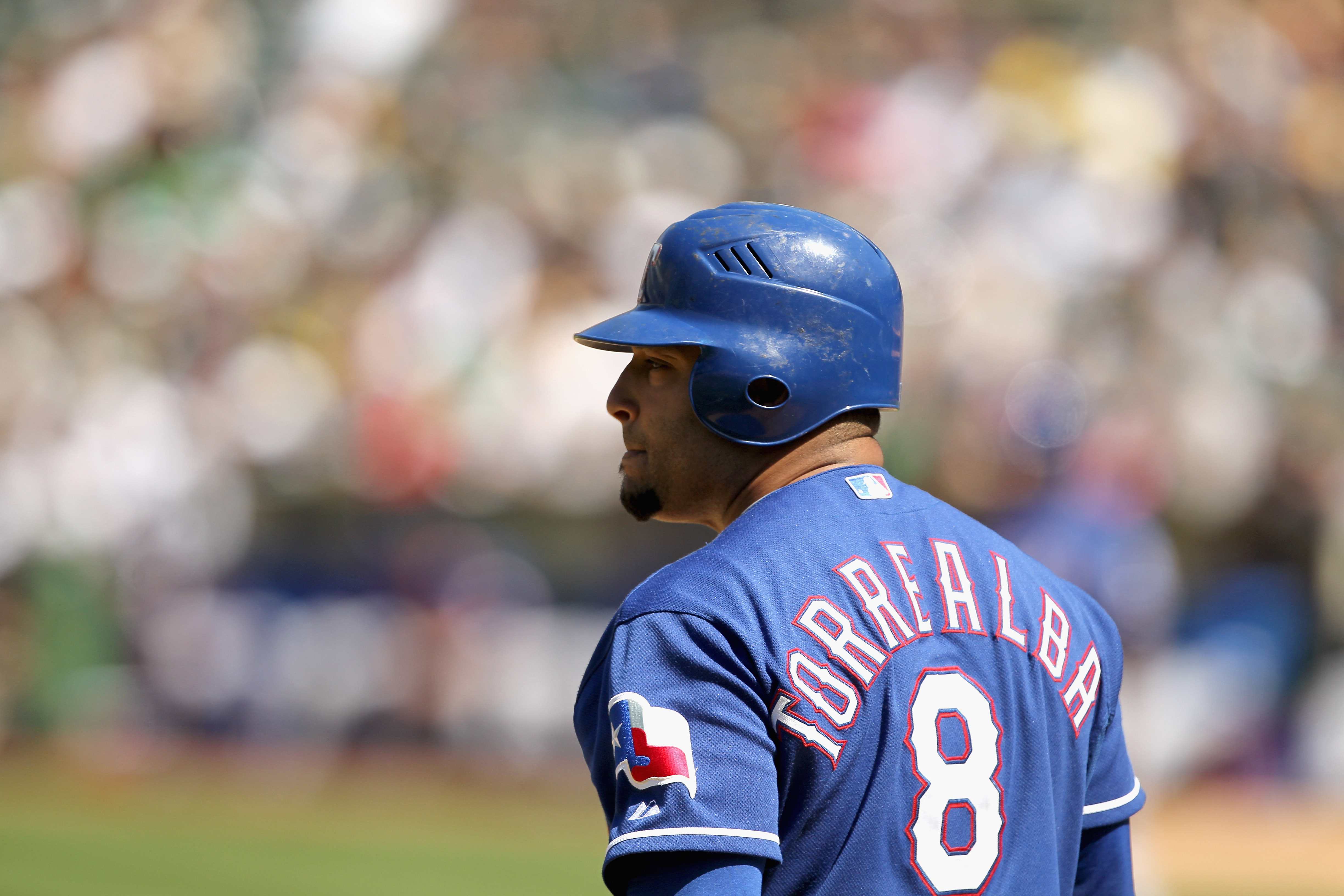 August 17, 2010; Chicago, IL, USA; San Diego Padres third baseman Miguel  Tejada (10) stands on first base after a walk during the first inning  against the Chicago Cubs at Wrigley Field.