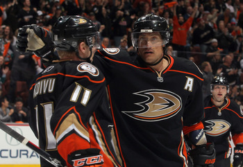 ANAHEIM, CA - APRIL 13:  Saku Koivu #11 and Teemu Selanne #8 of the Anaheim Ducks celebrate Selanne's third period goal against the Nashville Predators in Game One of the Western Conference Quarterfinals during the 2011 NHL Stanley Cup Playoffs at Honda C