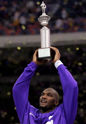 NEW ORLEANS - JANUARY 03:   Quarterback JaMarcus Russell #2 of the LSU Tigers holds up the MVP trophy after his team defeating the Notre Dame Fighting Irish in the 2007 Allstate Sugar Bowl on January 3, 2007 at the Superdome in New Orleans, Louisiana.  LS
