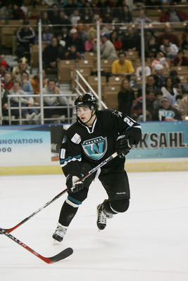 WORCESTER, MA - JANUARY 19: Riley Armstrong #20 of the Worcester Sharks skates against the Lowell Devils on January 19, 2007 at the DCU Center in Worcester, Massachussets. The Devils won 3-1. (Photo by Bruce Bennett/Getty Images)
