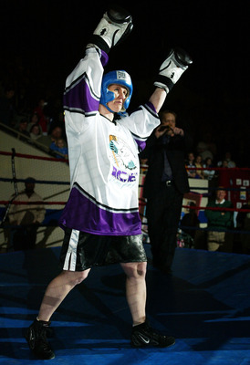 INDIANAPOLIS, IN - MARCH 12: Tonya Harding enters the ring for a boxing exhibition during the second period intermission at the Colorado Eagles versus Indianapolis Ice hockey game at the Pepsi Coliseum on March 12, 2004 in Indianapolis, Indiana. (Photo b