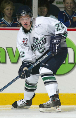 VANCOUVER - OCTOBER 2: Greg Scott #22 of the Seattle Thunderbirds skates against the Vancouver Giants during the WHL hockey game on October 2, 2005 at Pacific Coliseum in Vancouver, British Columbia, Canada. (Photo By Chris Relke/Getty Images)