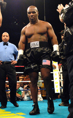 WASHINGTON - JUNE 11:  Mike Tyson enters the ring before the start of his heavyweight fight against Kevin McBride at the MCI Center June 11, 2005 in Washington, DC.  (Photo by Mitchell Layton/Getty Images)