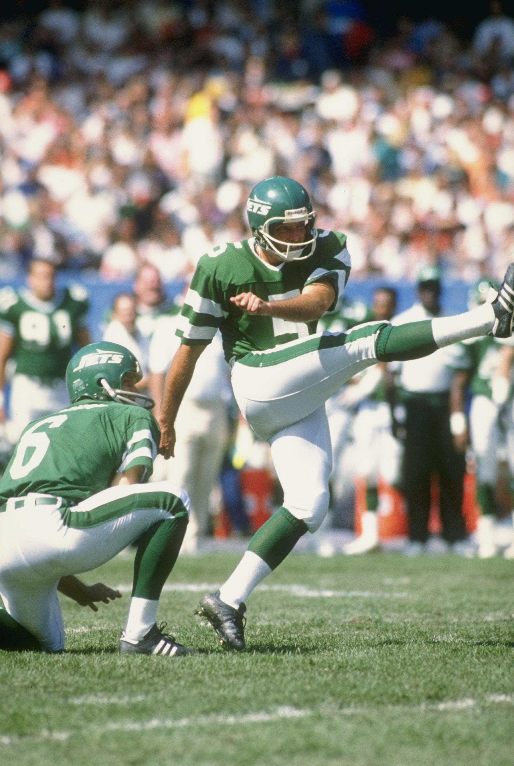 A fan operates a model of defensive end Mark Gastineau #99 of the