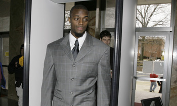 LEBANON - JANUARY 14: New York Giants wide receiver Plaxico Burress walks through security as he arrives at the Lebanon County Courthouse January 14, 2009 in Lebanon, Pa.  Burress is scheduled to appear in a civil trial in a dispute with an automobile dea