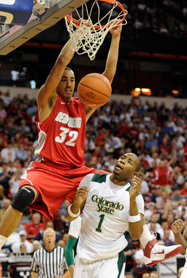 LAS VEGAS, NV - MARCH 10:  Drew Gordon #32 of the New Mexico Lobos dunks over Travis Franklin #1 of the Colorado State Rams during a quarterfinal game of the Conoco Mountain West Conference Basketball tournament at the Thomas & Mack Center March 10, 2011 