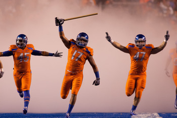 BOISE, ID - NOVEMBER 19:  Winston Venable #17 leads the Boise State Broncos onto the field before their game against the Fresno State Bulldogs at Bronco Stadium on November 19, 2010 in Boise, Idaho.  (Photo by Otto Kitsinger III/Getty Images)