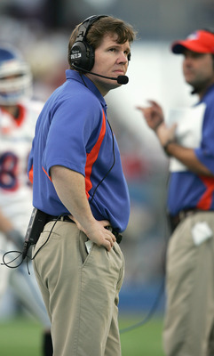 MEMPHIS,TN - DECEMBER 31:  Head coach Dan Hawkins of the Boise State Broncos looks on while facing the Louisville Cardinals during the AutoZone Liberty bowl at the Liberty Bowl on December 31, 2004 in Memphis, Tennessee.  Louisville won 44-40.  (Photo by 