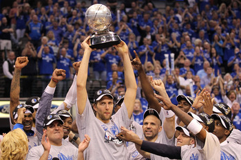 Miami, FLORIDA, USA. 12th June, 2011. Dallas Mavericks' Dirk Nowitzki (L)  celebrates with teammate Tyson Chandler near the end of Game 6 of the NBA  Finals basketball series against the Miami Heat