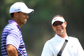 PONTE VEDRA BEACH, FL - MAY 10:  Tiger Woods (L) shares a laugh with his instructor Sean Foley (R) during a practice round prior to the start of THE PLAYERS Championship held at THE PLAYERS Stadium course at TPC Sawgrass on May 10, 2011 in Ponte Vedra Bea