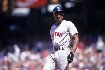 ANAHEIM, CA - JULY 7:  Andre Dawson #10 of the Boston Red Sox looks on as he walks on the field during a game with the California Angels at Angel Stadium on July 7, 1993 in Anaheim, California.  (Photo by Stephen Dunn/Getty Images)