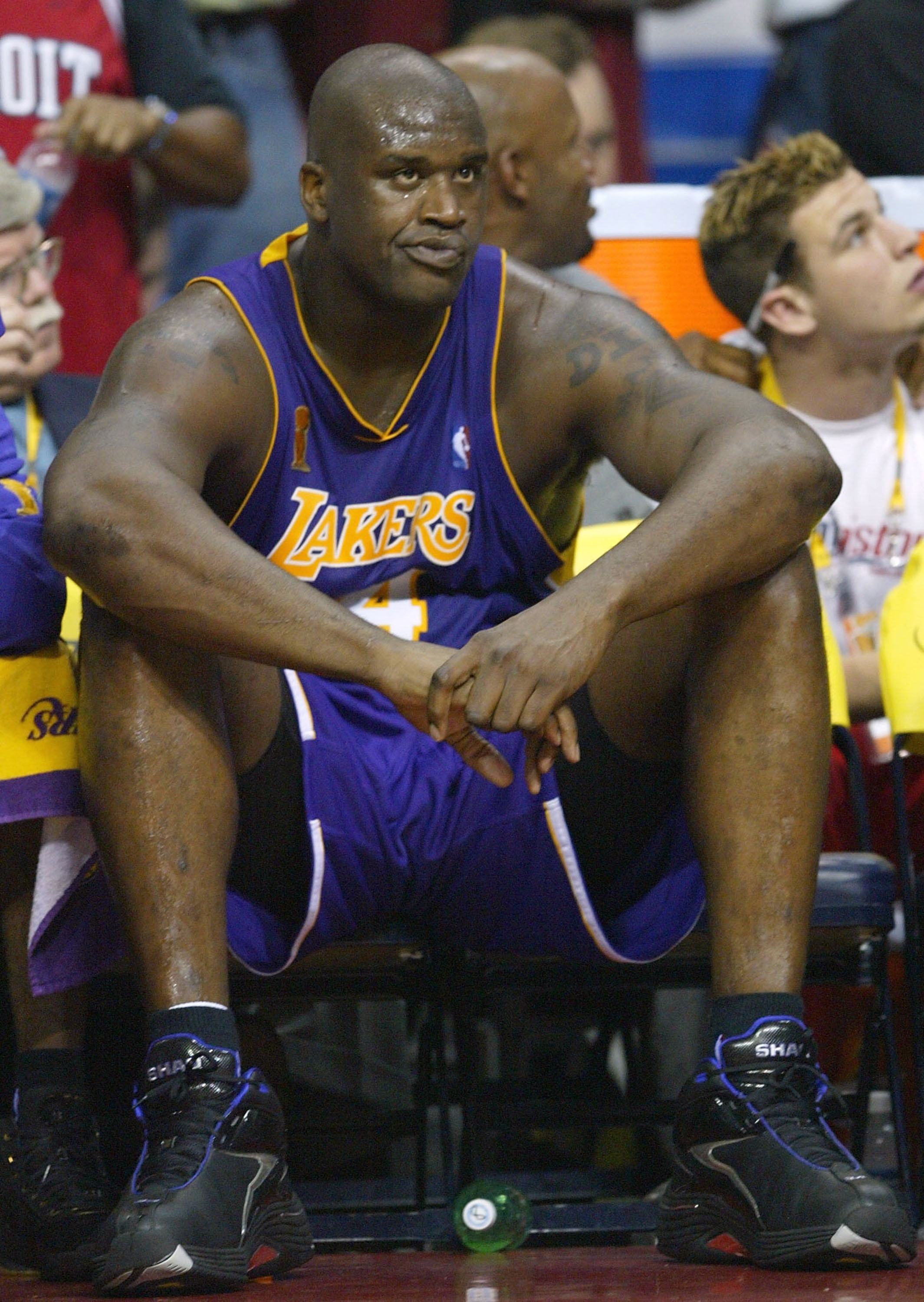 AUBURN HILLS, MI - JUNE 15:  Shaquille O'Neal #34 of the Los Angeles Lakers looks on from the bench in the fourth quarter of game five of the 2004 NBA Finals against the Detroit Pistons on June 15, 2004 at The Palace of Auburn Hills in Auburn Hills, Michi