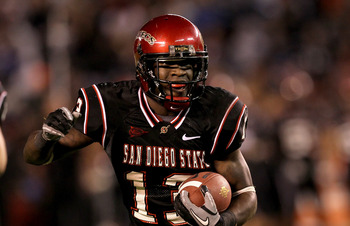 SAN DIEGO - NOVEMBER 20: Running back Ronnie Hillman #13 of the San Deigo State Aztecs carries the ball on a five yard touchdown run in the second quarter against the Utah Utes at Qualcomm Stadium on November 20, 2010 in San Diego, California. (Photo by