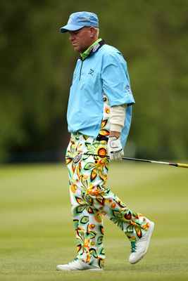 VIRGINIA WATER, ENGLAND - MAY 27:  John Daly of the USA walks up a fairway during the second round of the BMW PGA Championship at the Wentworth Club on May 27, 2011 in Virginia Water, England.  (Photo by Ian Walton/Getty Images)