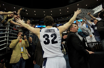 DENVER, CO - MARCH 19:  Jimmer Fredette #32 of the Brigham Young Cougars runs off of the court after defeating the Gonzaga Bulldogs during the third round of the 2011 NCAA men's basketball tournament at Pepsi Center on March 19, 2011 in Denver, Colorado.