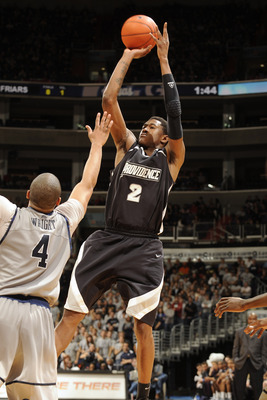WASHINGTON, DC - FEBRUARY 5:  Marshon Brooks #2 of the Providence Friars takes a jump shot over Chris Wright #4 of the Georgetown Hoays during a college basketball game on February 5, 2011 at the Verizon Center in Washington, DC.  The Hoyas won 83-81.  (P